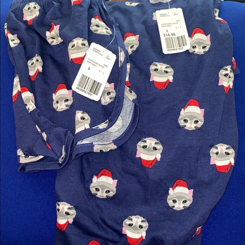 Pajamas with cats with little Santa hats on